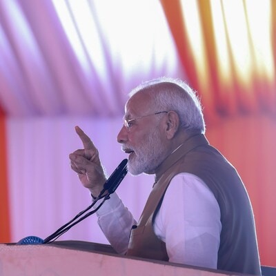 PM Modi encourages use of RBI's digital currency at Odisha scheme launch. Finance News