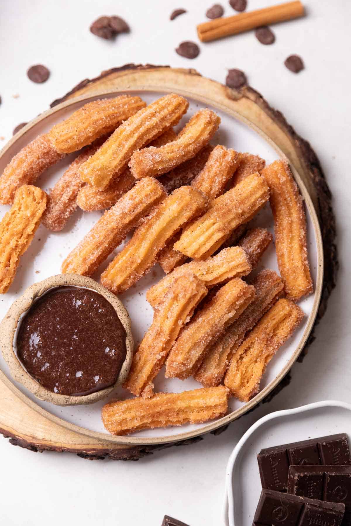 eggless churros served with chocolate sauce