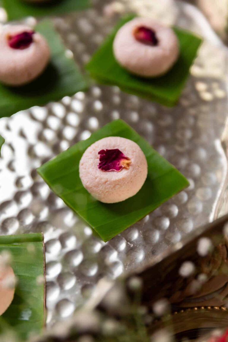 rose kacha gola garnished with dried rose petal and served on a leaf square