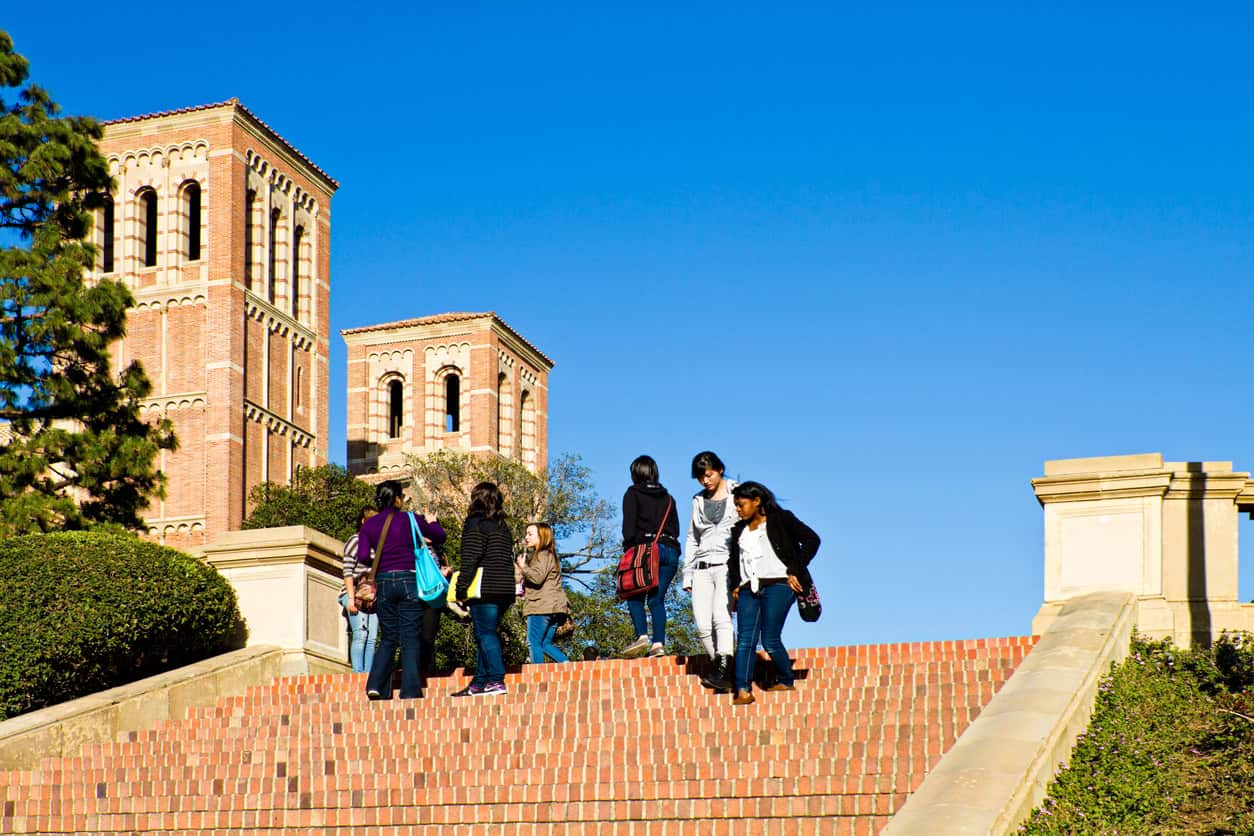 Students travel between classes on university campus