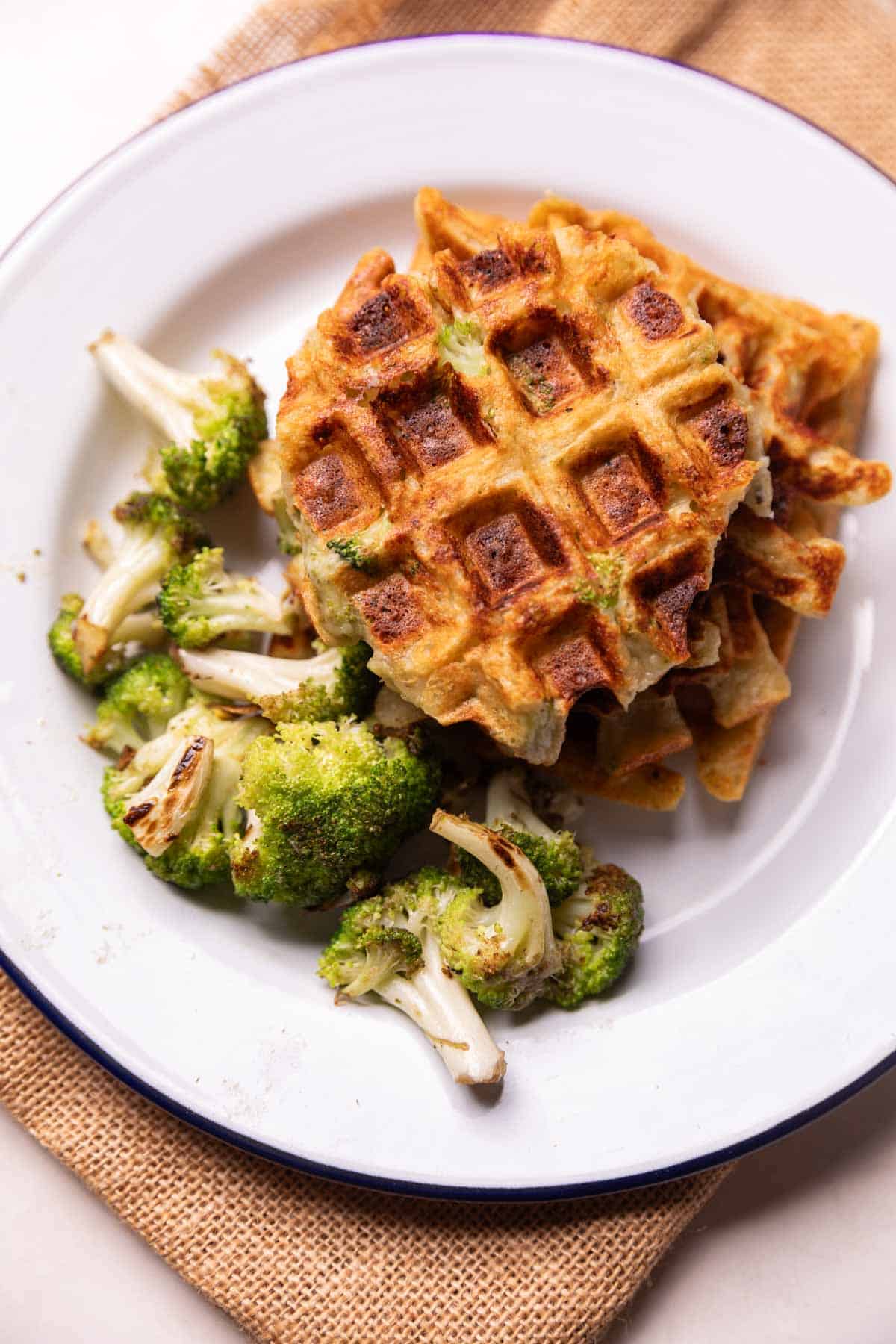 broccoli cheese waffle served with a side of roasted broccoli