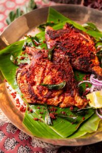 an image of Mangalore fish fry with accompaniments