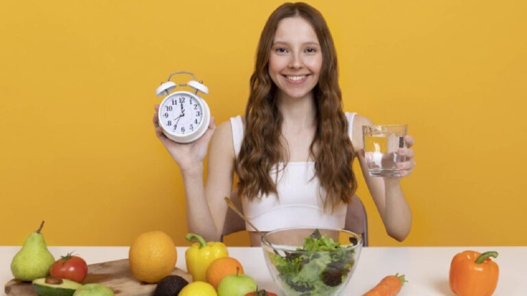 A woman holding a clock