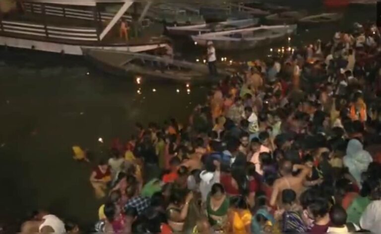 Devotees take holy dip in river Ganga in Varanasi on the occasion of Kartik Purnima