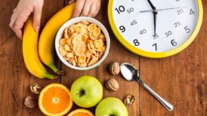 Fruits and an alarm clock